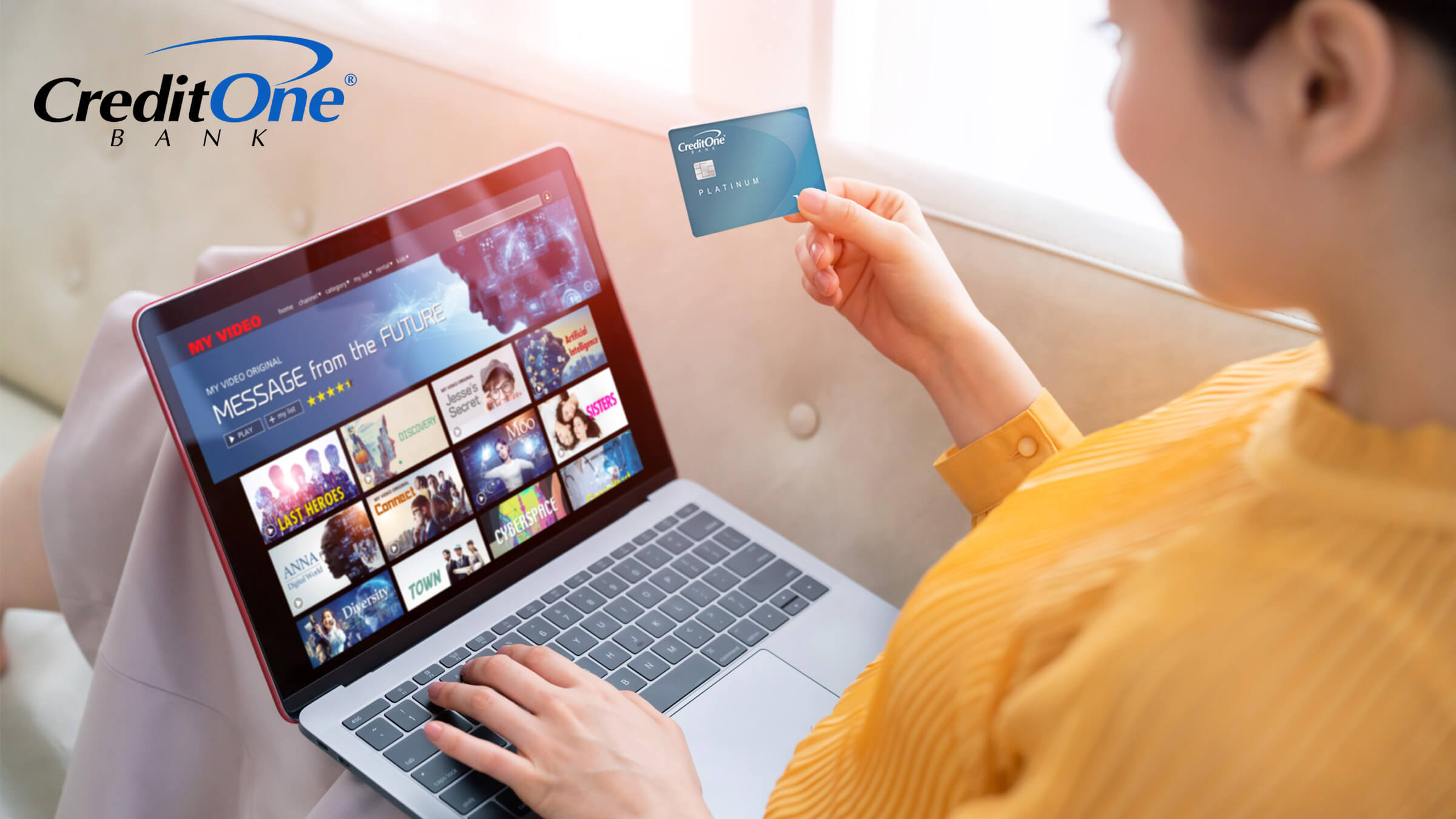 A woman pays for her monthly streaming subscription service with a credit card, possibly hoping to build credit.